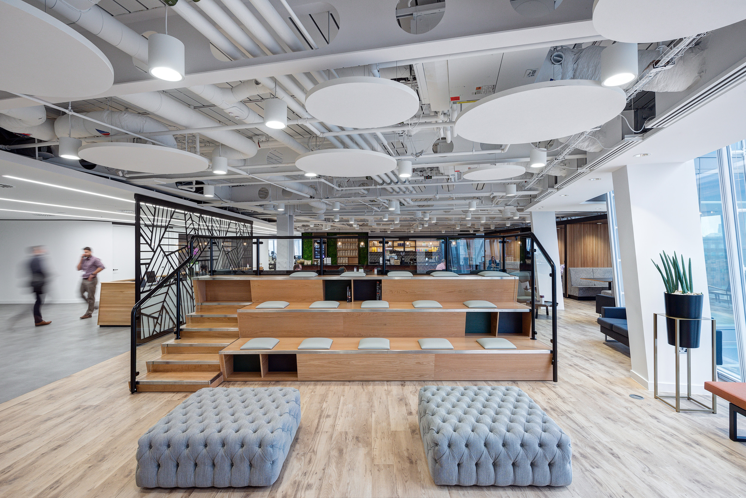 Tiered seating area in MITIE’s office, facilitating informal meetings and presentations. The space is designed to encourage spontaneous collaboration.