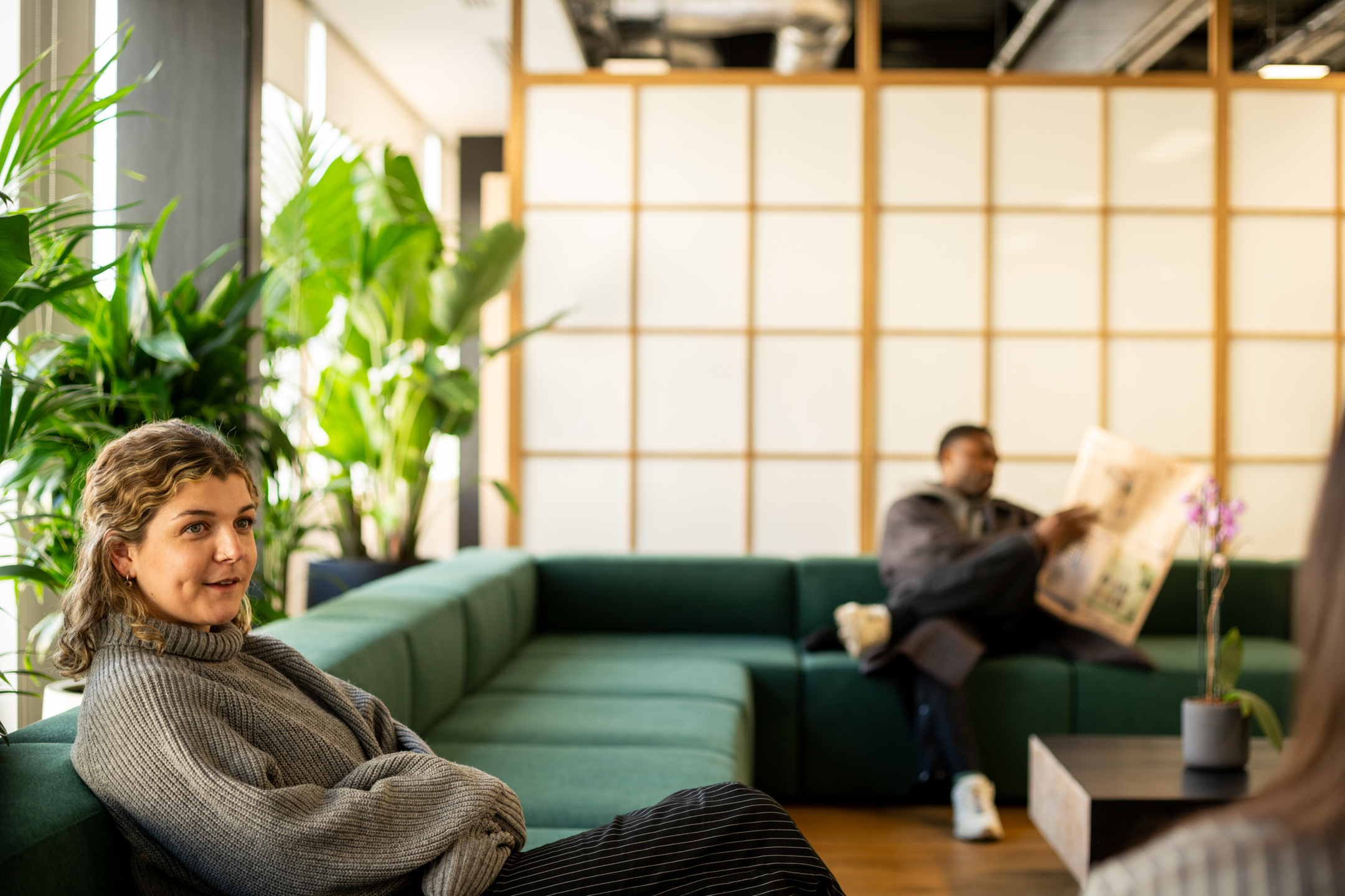 Shionogi lounge area with a Japanese style backwall divider and biophilic elements