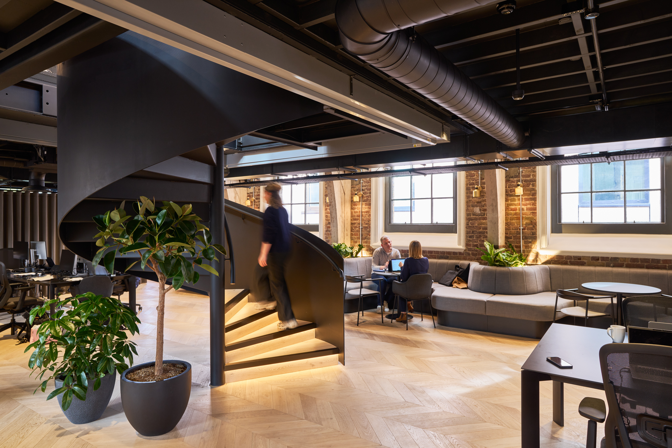 Lotus' high performance workspace, containing a feature staircase and heritage elements.